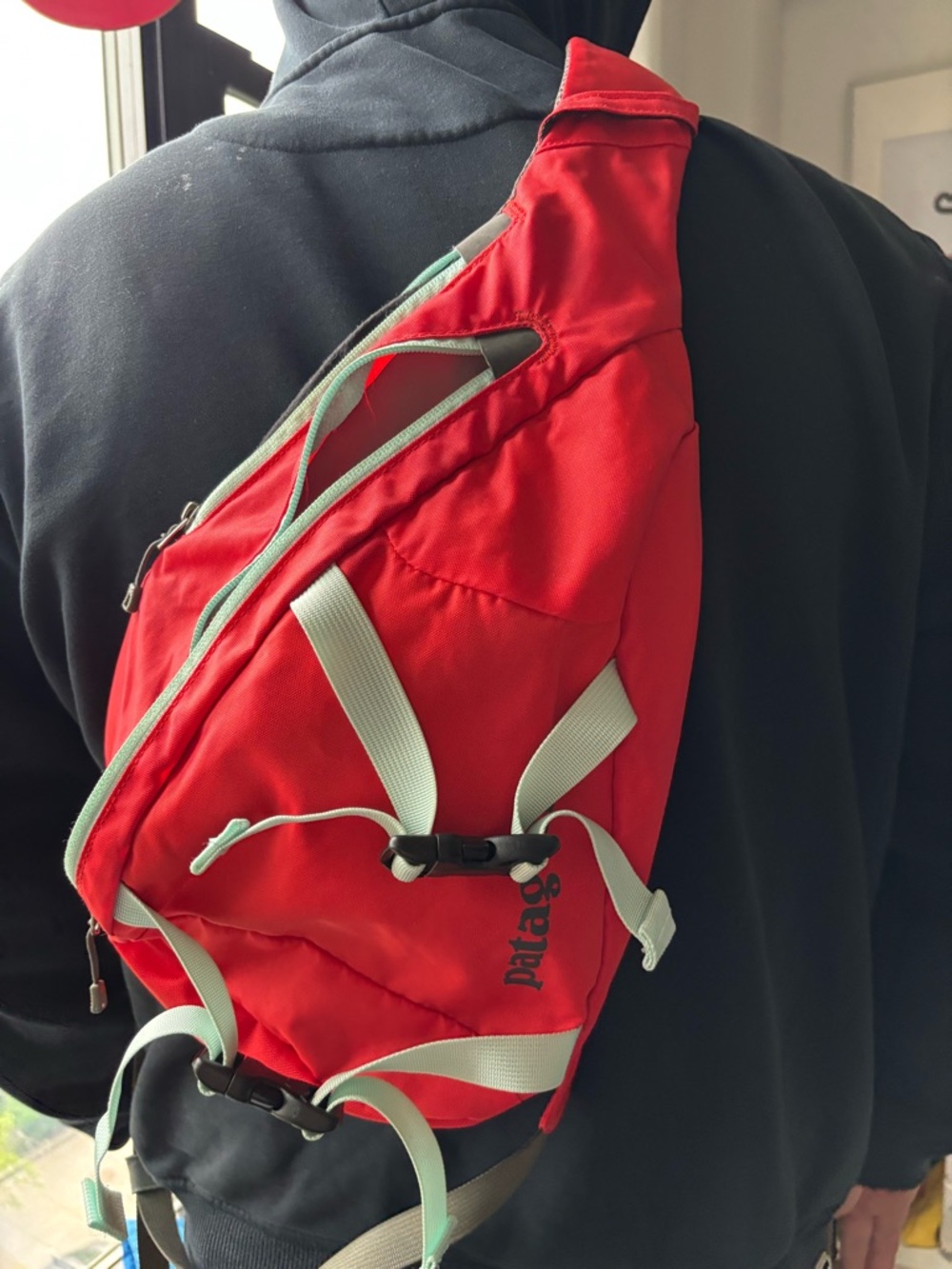 Patagonia Atom Sling Bag with Light Blue Trim Excellent Condition